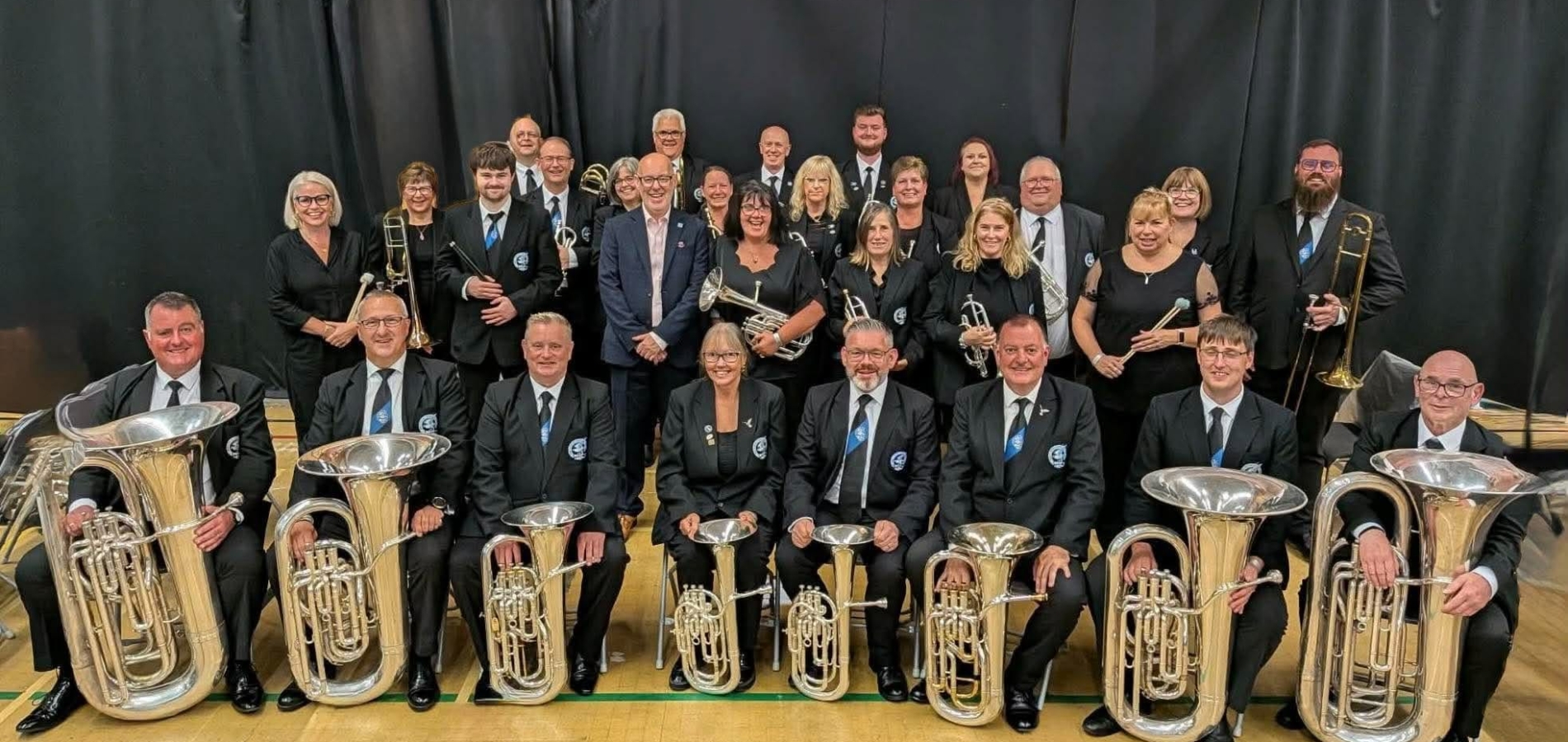 A photo of the band after performing at the national finals at the York Barbican